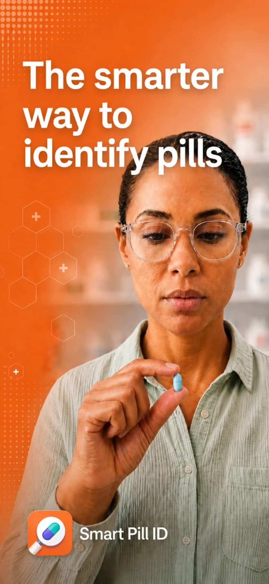 Pharmacist holding up a small blue pill. The smarter way to identify pills with Smart Pill ID.